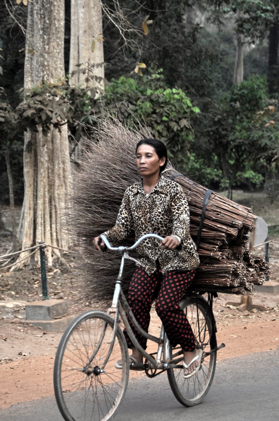 image of a woman riding a bike